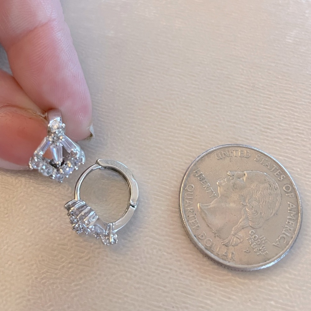 Silver toned hoop earrings with crystals